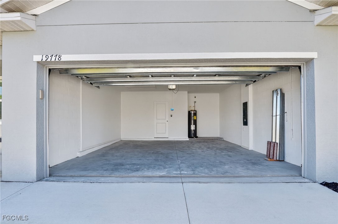 19778 Garden Ridge Lehigh Acres, FL 33936 - Photo 25 of 31 a view of a garage
