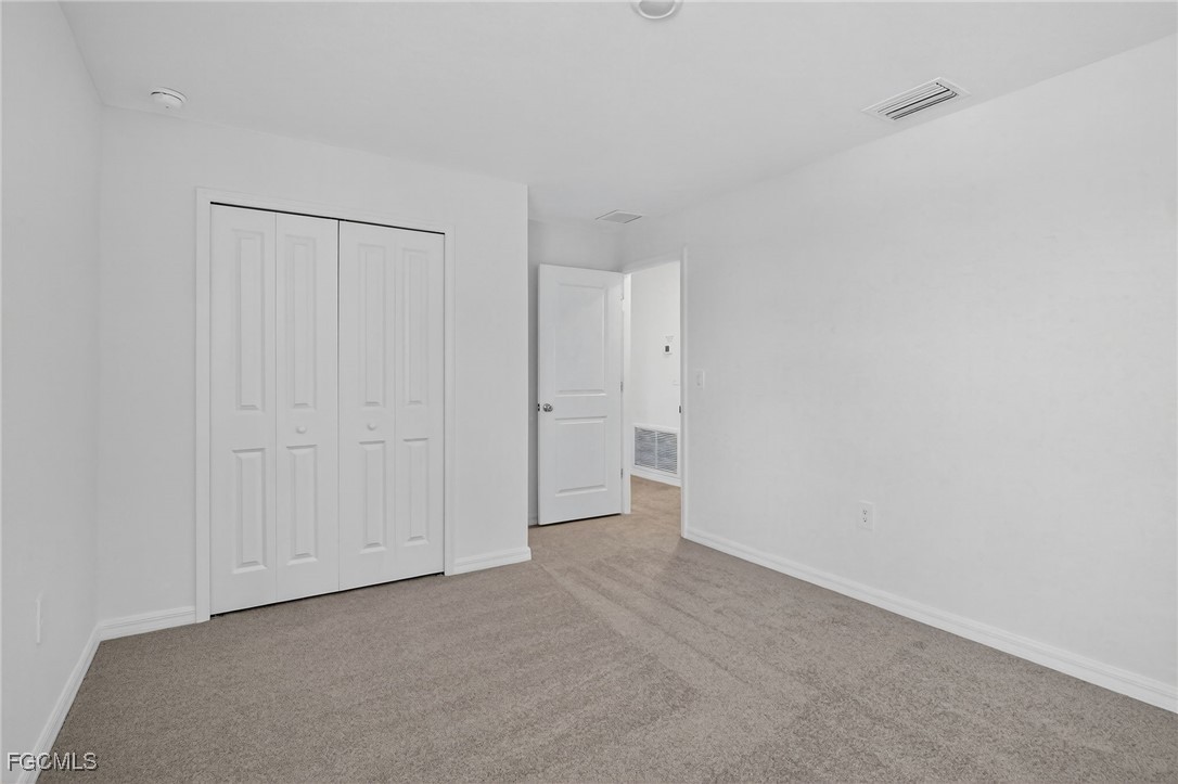 19778 Garden Ridge Lehigh Acres, FL 33936 - Photo 9 of 31 a view of an empty room