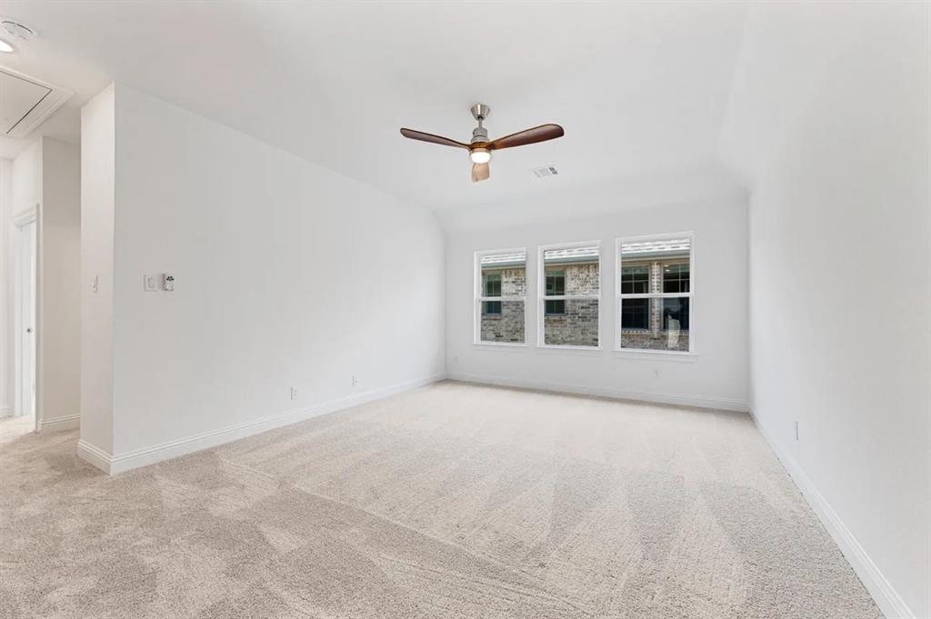 9337 Loggerhead Way Fort Worth, TX 76118 - Photo 30 of 40 a view of a big room with windows and ceiling fan