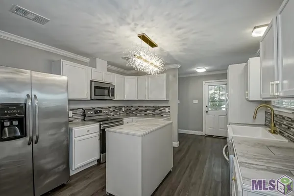 $232,500 | 9493 Gene Buckle Avenue, Denham Springs, LA 70726