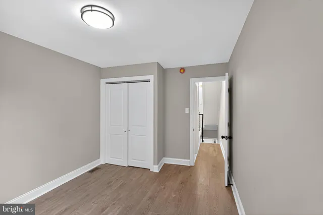 a view of a livingroom with wooden floor