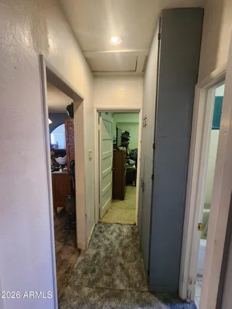 a bathroom with a sink a toilet and a shower