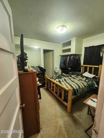 a room with furniture and a book shelf