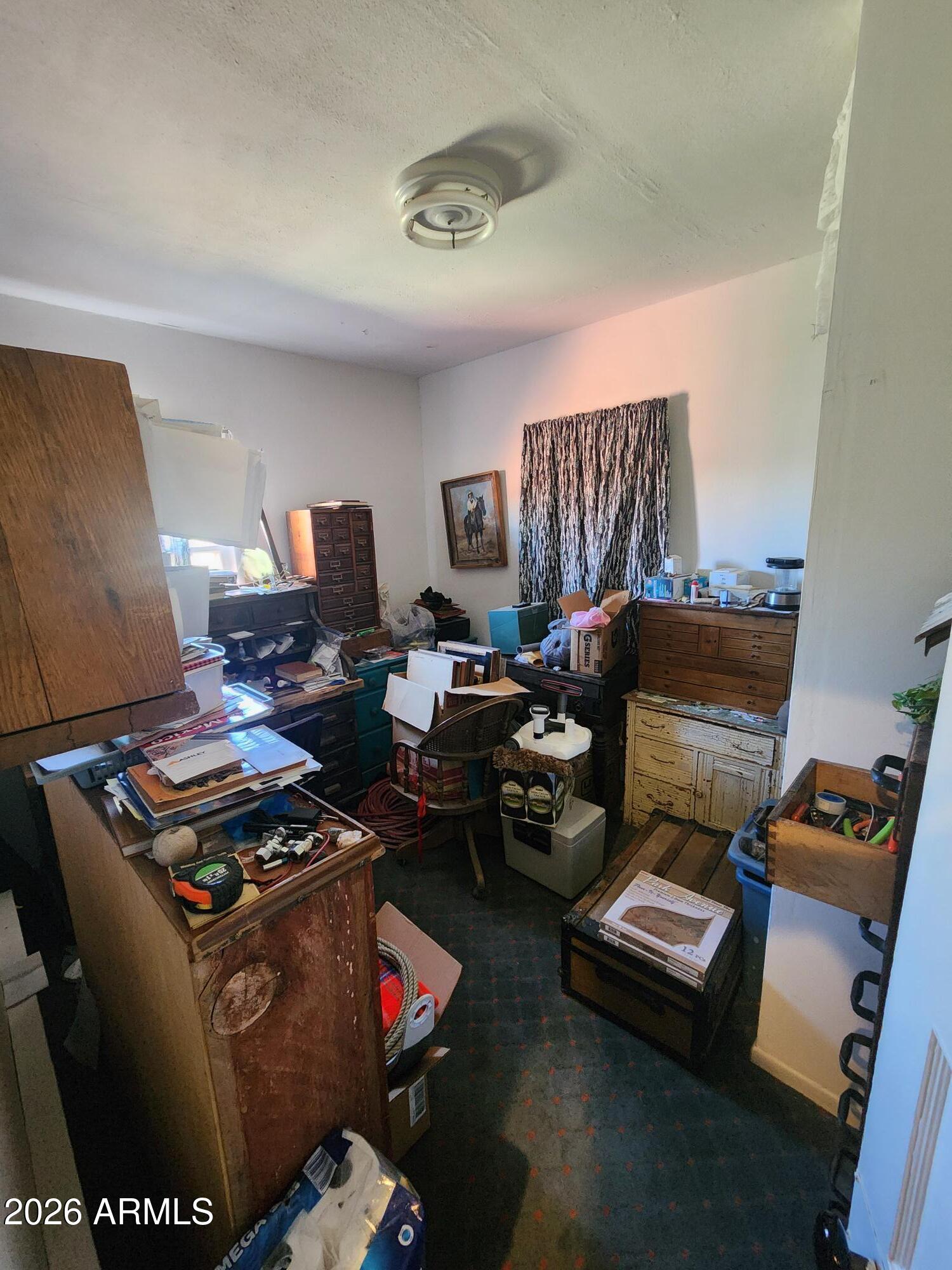26115 Ghost Town Road Congress, AZ 85332 - Photo 18 of 64 a living room with furniture and a window