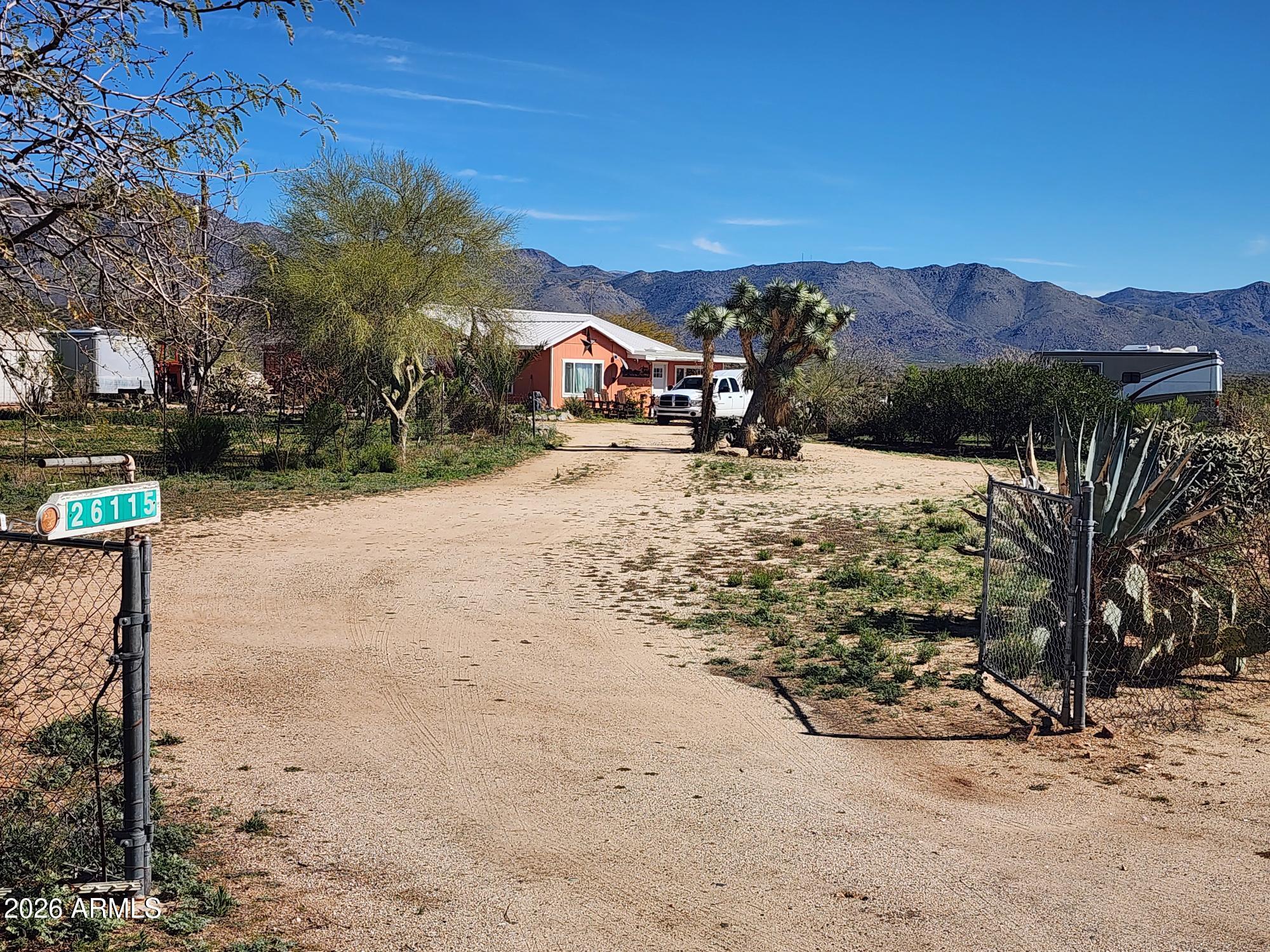 26115 Ghost Town Road Congress, AZ 85332 - Photo 22 of 64 a view of a road with a yard