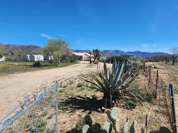 a view of a backyard of a house