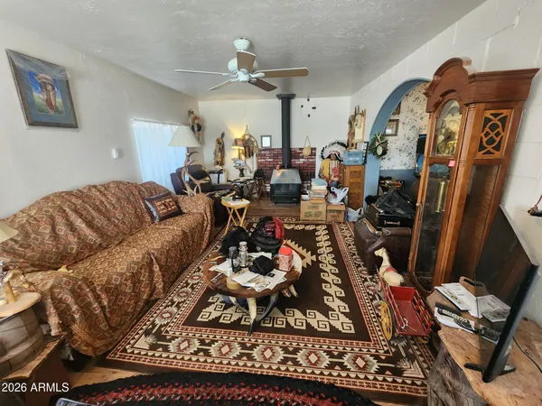 a living room with lots of furniture and rug