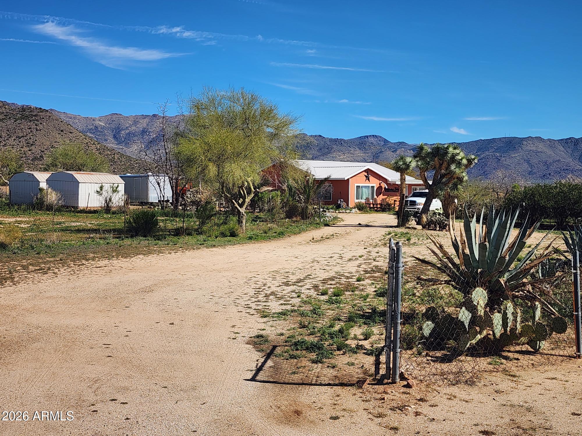 26115 Ghost Town Road Congress, AZ 85332 - Photo 31 of 64 a view of a town with mountains in the background