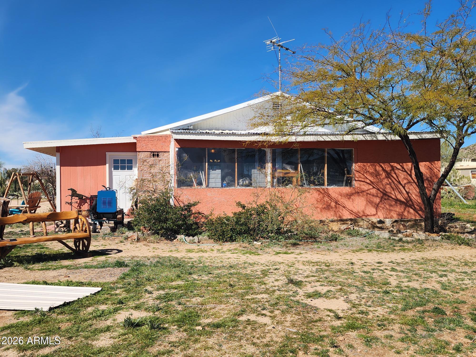26115 Ghost Town Road Congress, AZ 85332 - Photo 38 of 64 a front view of a house with a yard