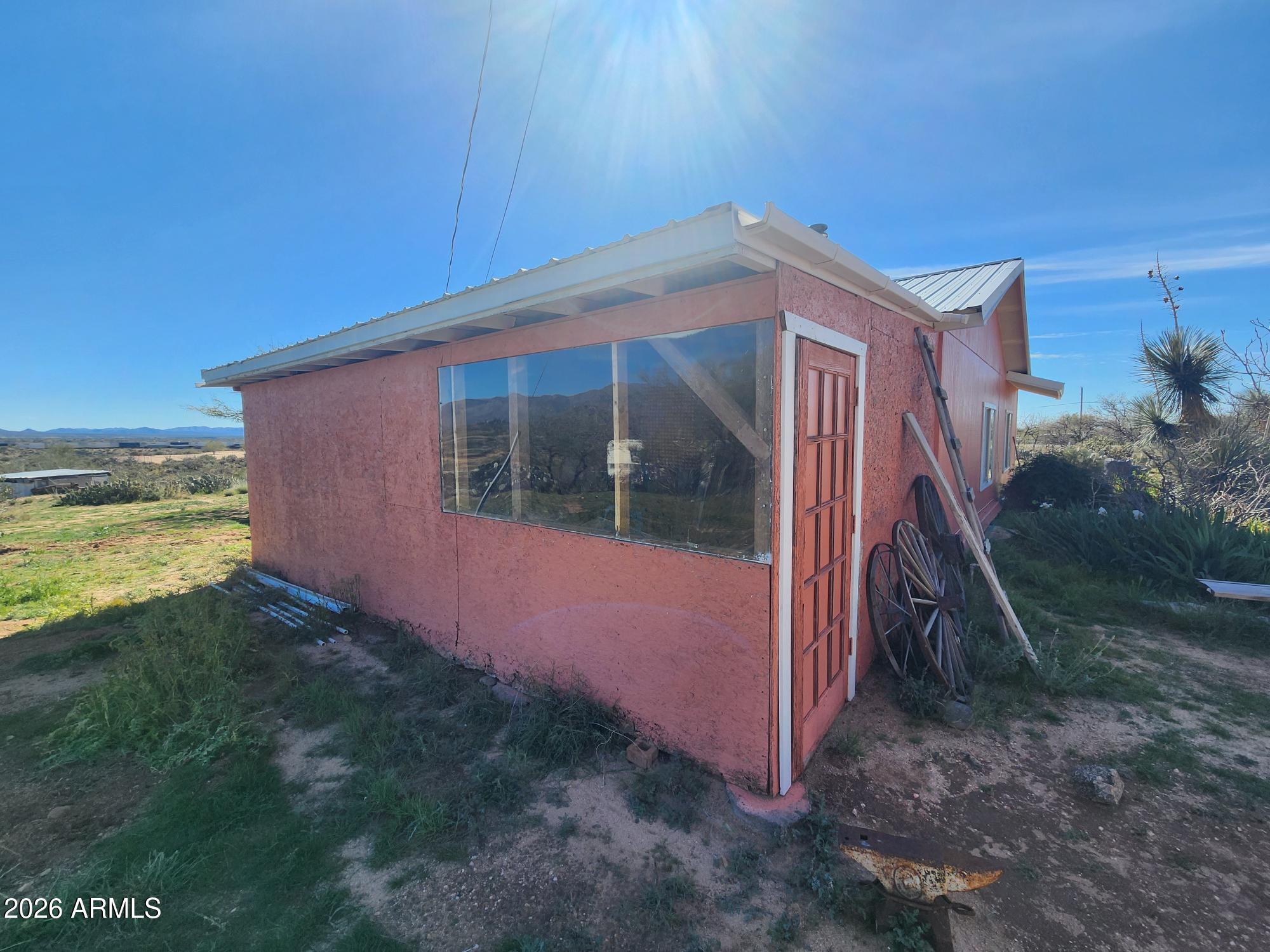 26115 Ghost Town Road Congress, AZ 85332 - Photo 44 of 64 a view of a house with backyard