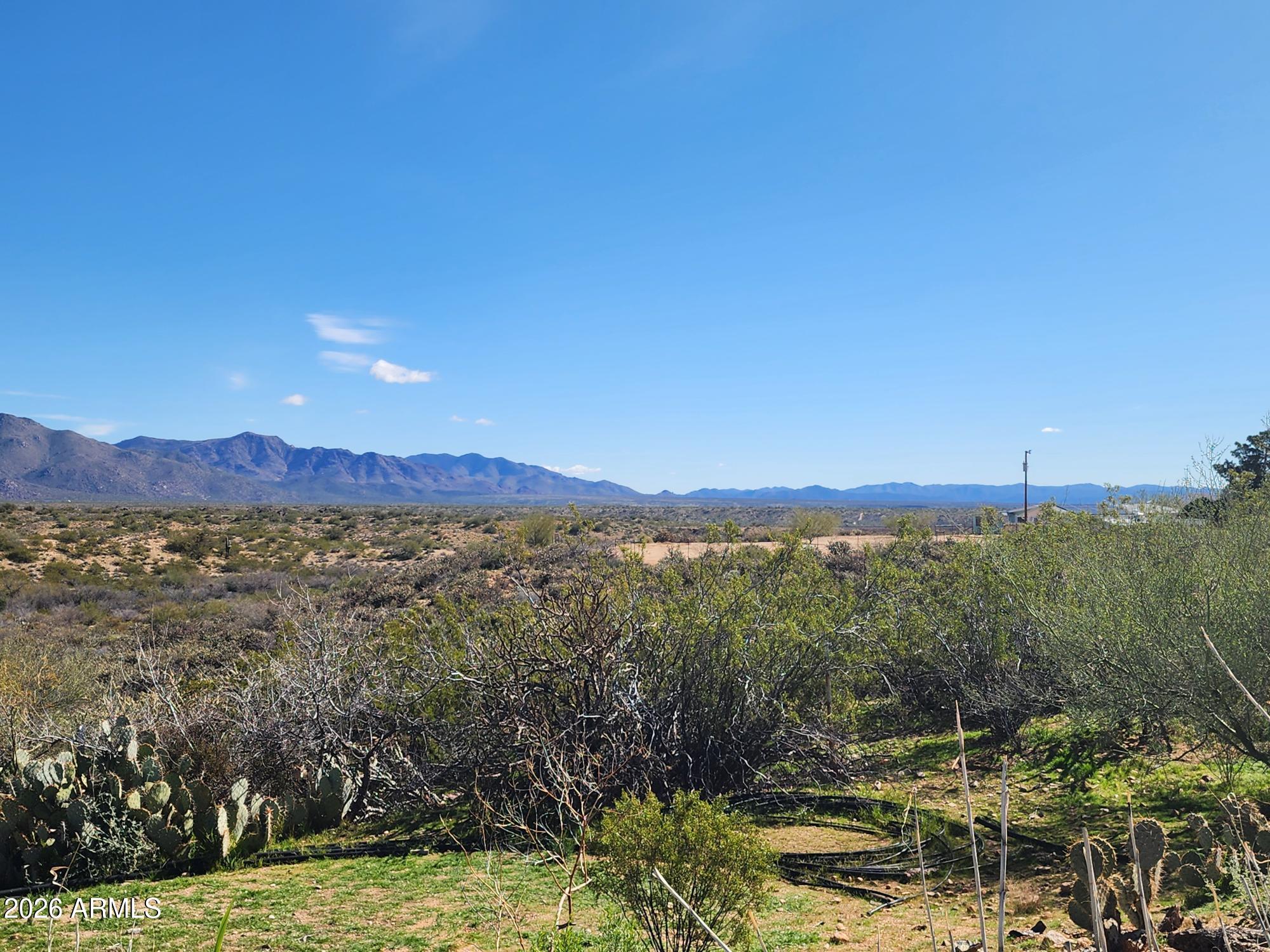 26115 Ghost Town Road Congress, AZ 85332 - Photo 63 of 64 a view of a lake with a mountain in the background