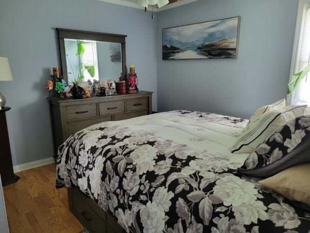 225 Hemlock Avenue Romeoville, IL 60446 - Photo 19 of 32 a bedroom with a bed and dresser