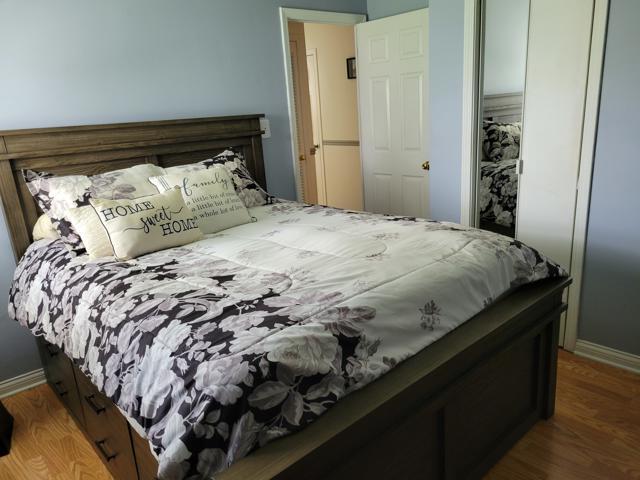 225 Hemlock Avenue Romeoville, IL 60446 - Photo 20 of 32 a bedroom with a bed and a window
