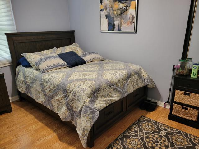 225 Hemlock Avenue Romeoville, IL 60446 - Photo 22 of 32 a bedroom with bed and window