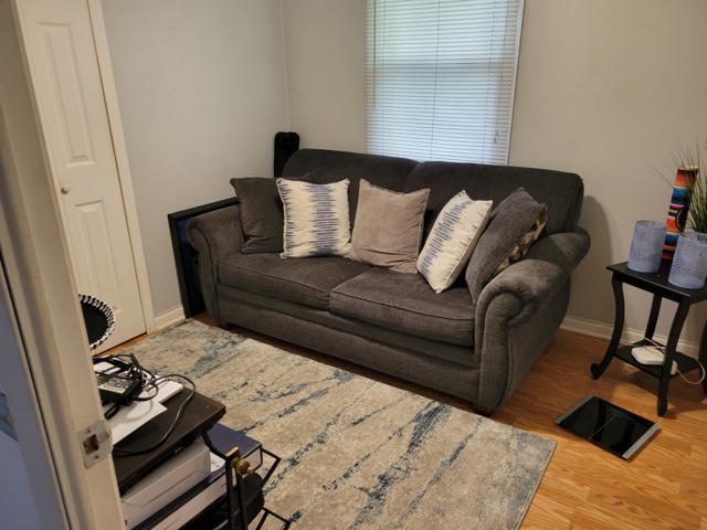 225 Hemlock Avenue Romeoville, IL 60446 - Photo 24 of 32 a living room with a bed and furniture