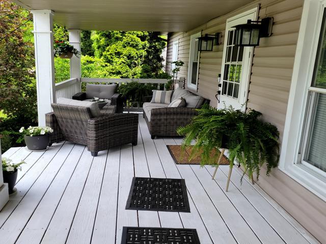 225 Hemlock Avenue Romeoville, IL 60446 - Photo 3 of 32 a view of balcony with furniture and wooden floor
