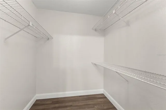 a view of an empty walk in closet