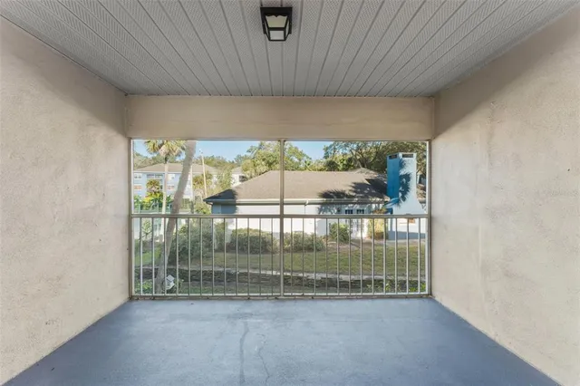 a view of a room with sliding glass door