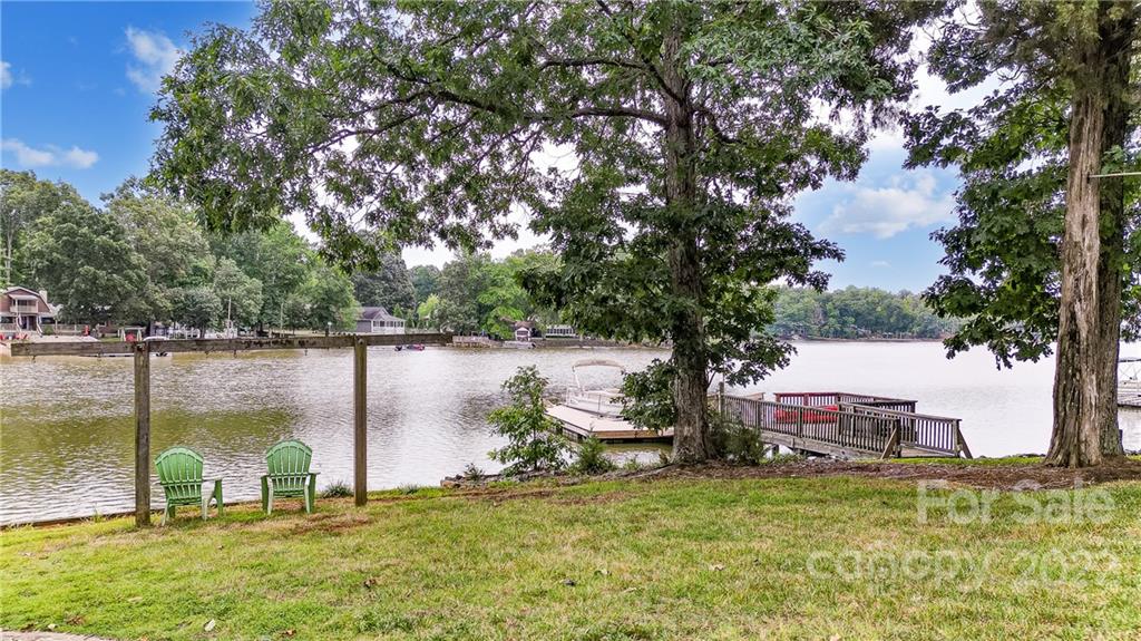 1902 Riverview Rd Extension, Unit 20 & 21 Lexington, NC 27292 - Photo 1 of 48 a backyard of a house with table and chairs