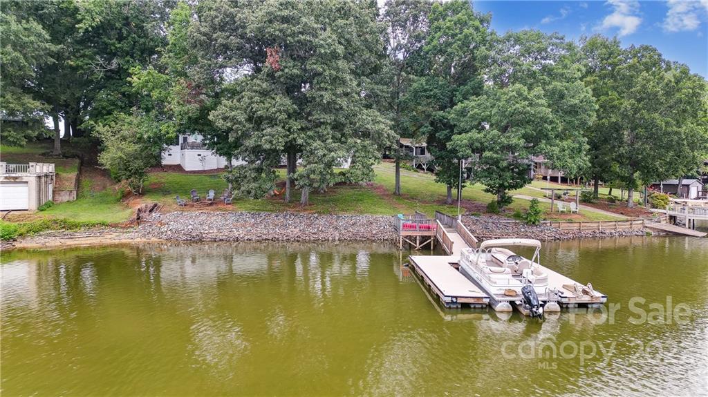 1902 Riverview Rd Extension, Unit 20 & 21 Lexington, NC 27292 - Photo 8 of 48 a view of a lake with trees