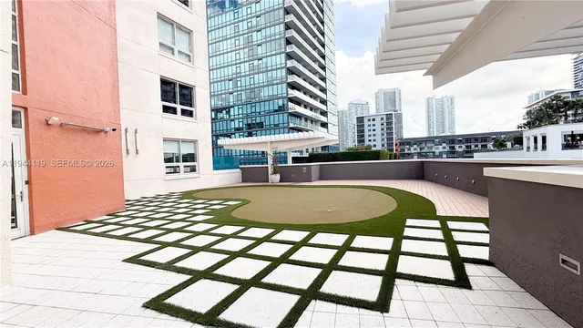 a view of a swimming pool from a balcony