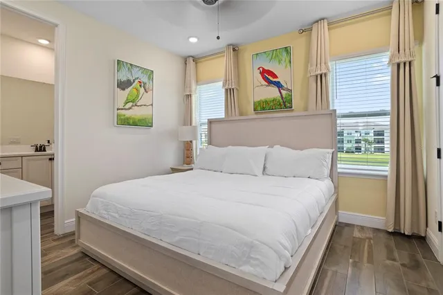 a bathroom with a shower a toilet and a sink