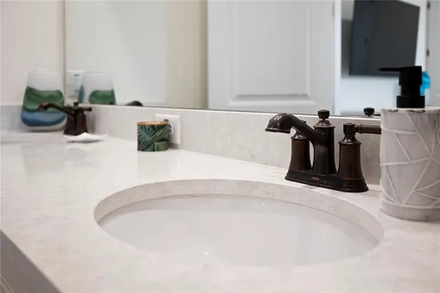 a bedroom with bed and a window