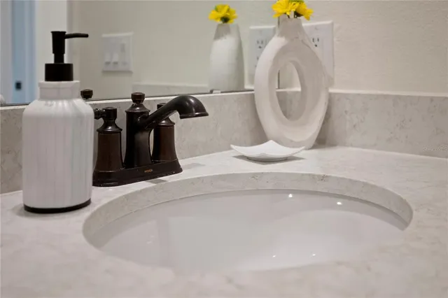 a view of a large body of water with a building in the background