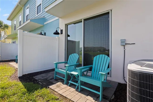 an aerial view of residential houses and outdoor space