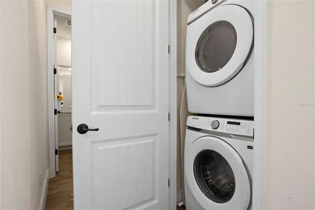 a bathroom with a toilet a sink and a mirror