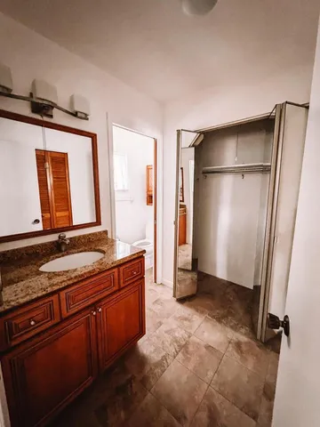 a bathroom with a tub and shower