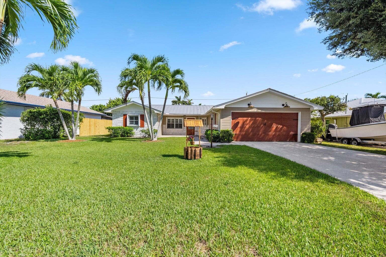 8053 Southeast Carlton Street Hobe Sound, FL 33455 - Photo 2 of 33 2