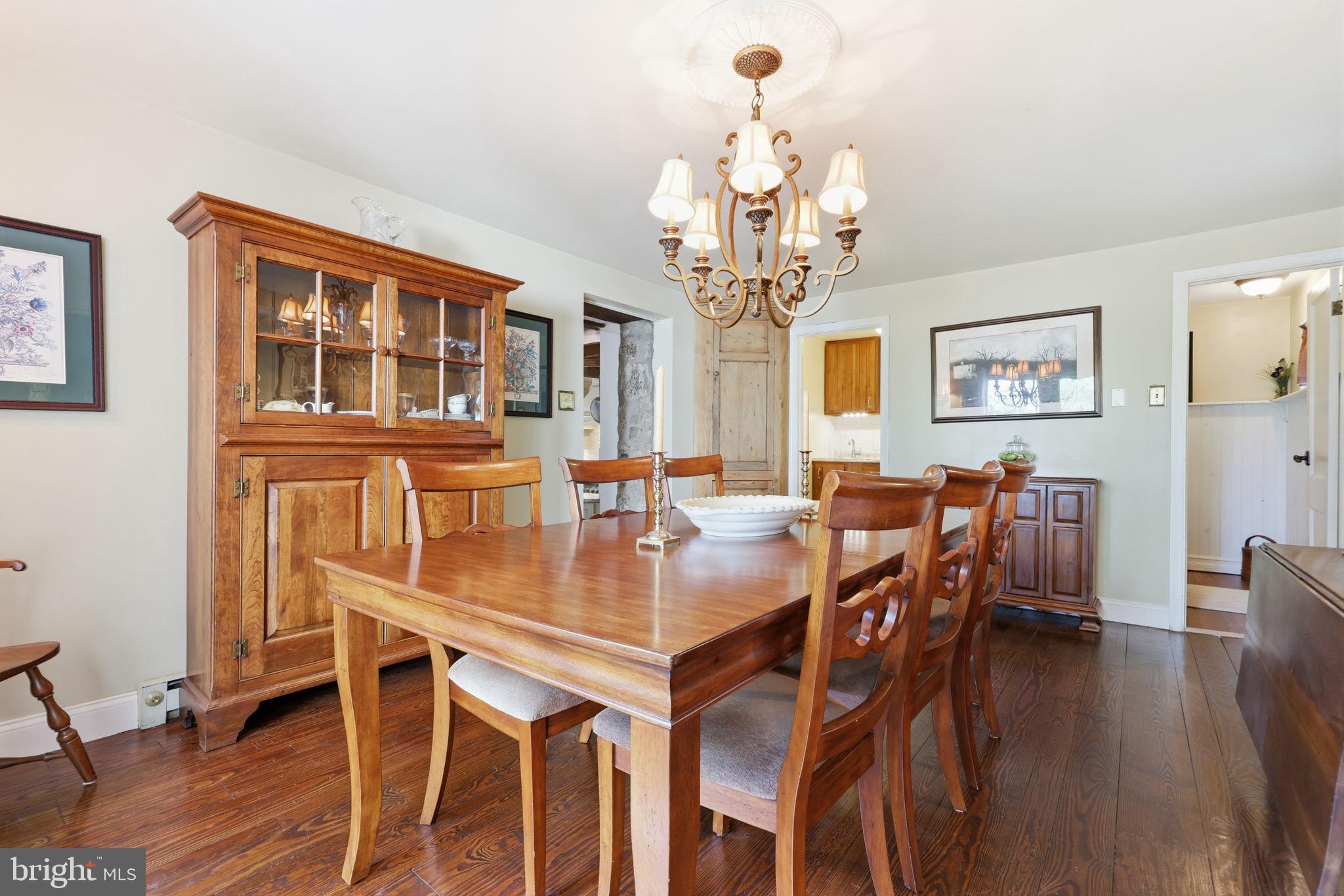 43 Twining Ford Road Richboro, PA 18954 - Photo 22 of 57 a view of a dining room with furniture wooden floor and chandelier