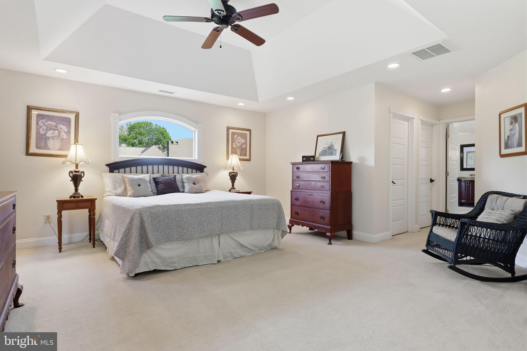 43 Twining Ford Road Richboro, PA 18954 - Photo 32 of 57 a bedroom with a bed a couch and a chandelier