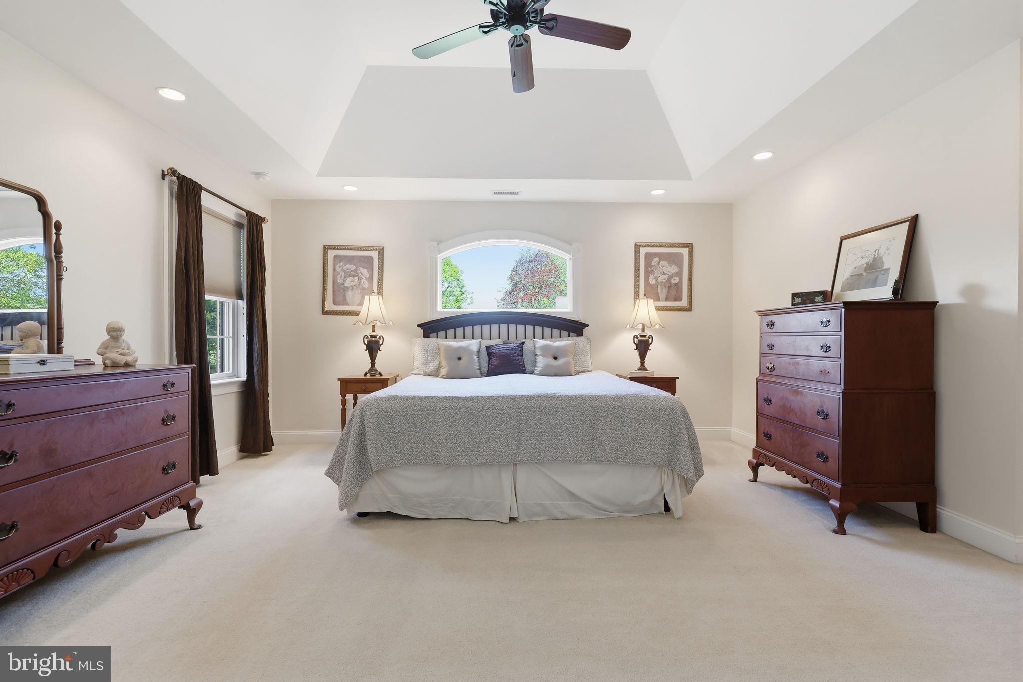 43 Twining Ford Road Richboro, PA 18954 - Photo 33 of 57 a bedroom with a bed and a chandelier