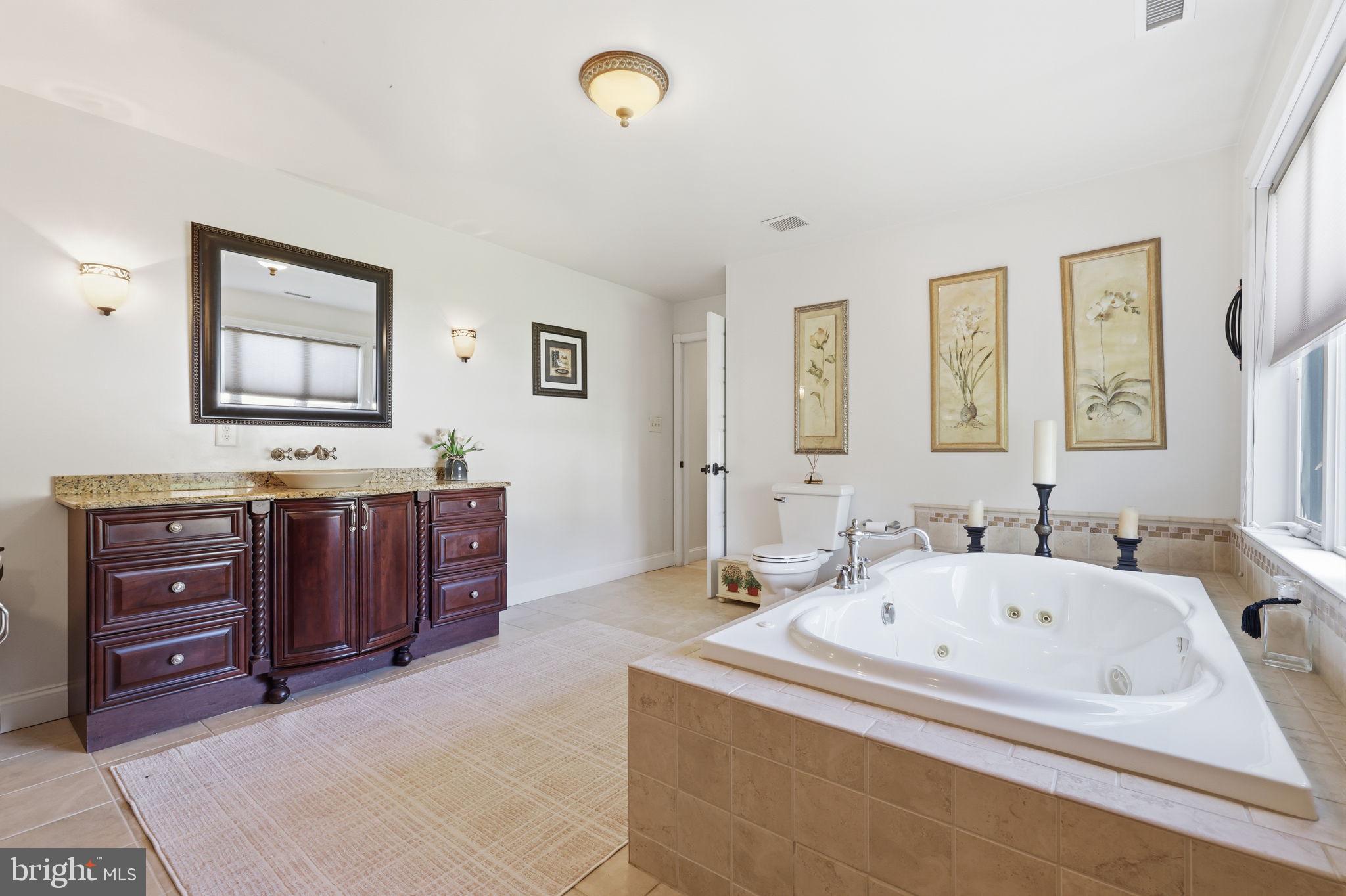 43 Twining Ford Road Richboro, PA 18954 - Photo 35 of 57 a bathroom with a tub sink and mirror