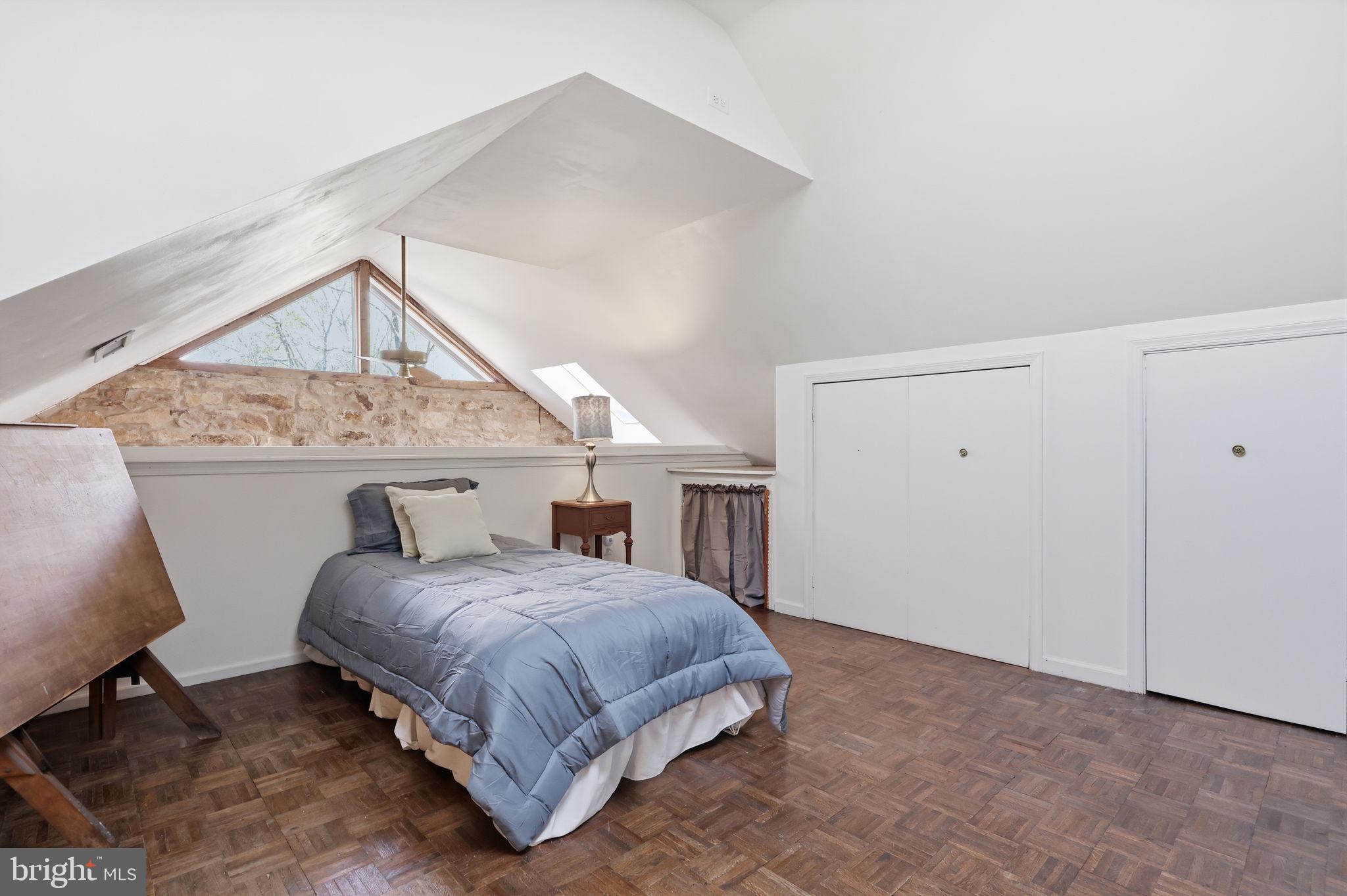 43 Twining Ford Road Richboro, PA 18954 - Photo 42 of 57 a bedroom with a bed a table and painting