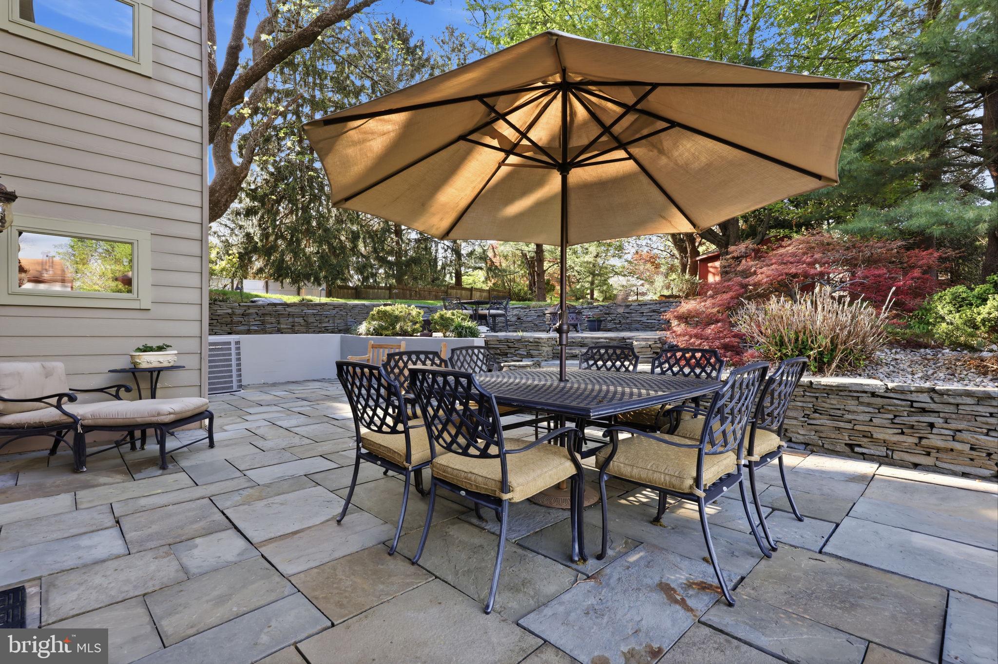 43 Twining Ford Road Richboro, PA 18954 - Photo 44 of 57 a patio with a patio table and chairs