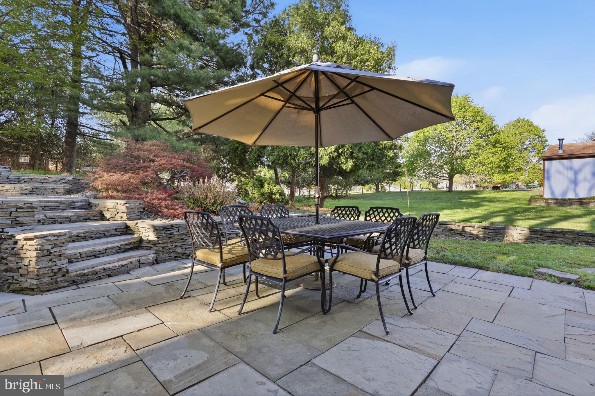 43 Twining Ford Road Richboro, PA 18954 - Photo 45 of 57 a view of table and chairs under an umbrella