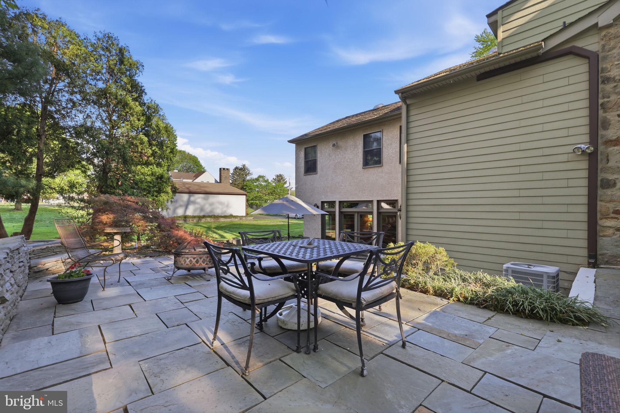 43 Twining Ford Road Richboro, PA 18954 - Photo 48 of 57 a view of a patio with table and chairs and potted plants