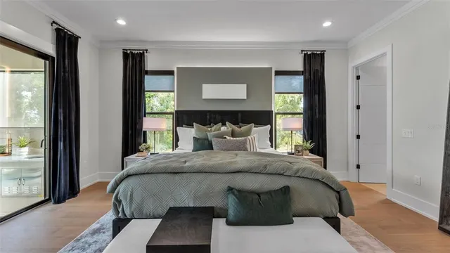 a bedroom with a bed furniture and a window