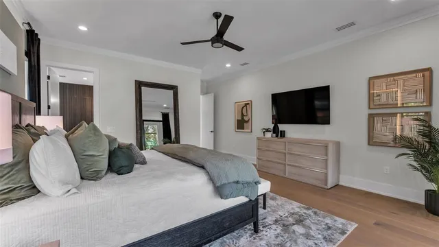 a bathroom with a sink double vanity mirror and a bathtub