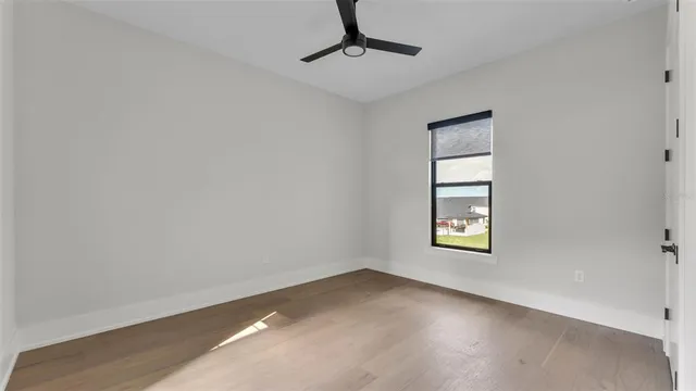 a view of a livingroom with wooden floor