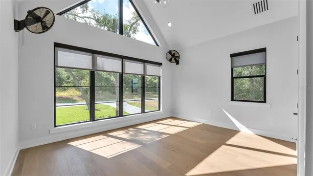 a building outdoor space with patio furniture and potted plants