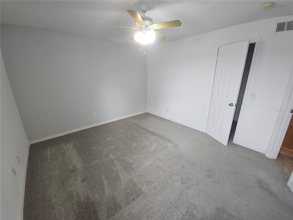 5160 Conroy Road, Unit 1437 Orlando, FL 32811 - Photo 27 of 36 a view of an empty room