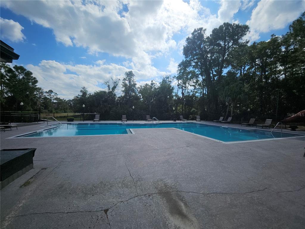5160 Conroy Road, Unit 1437 Orlando, FL 32811 - Photo 34 of 36 a view of a tennis court