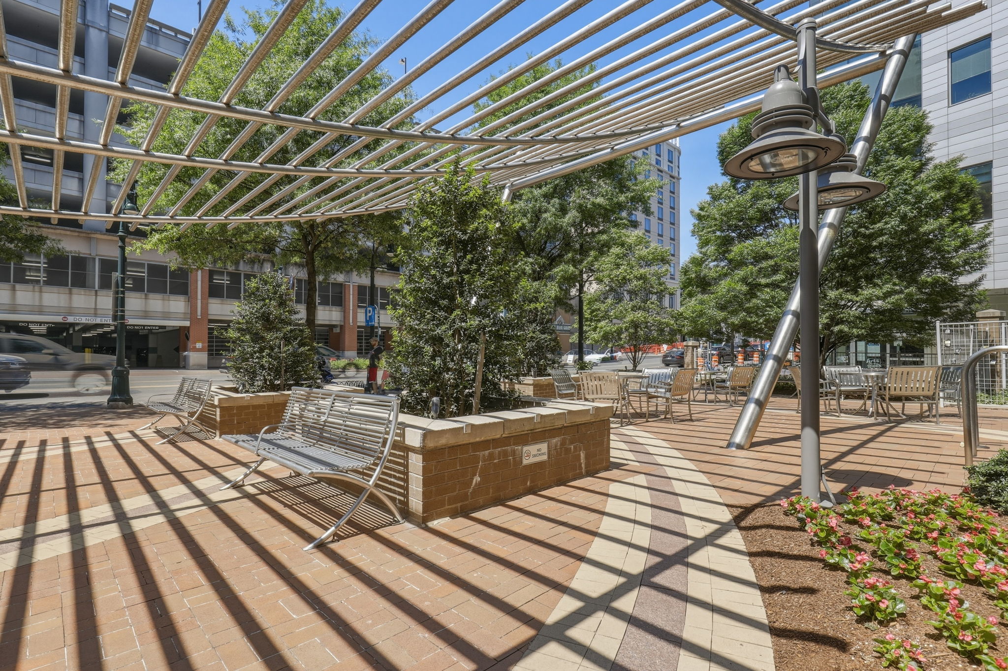 930 Wayne Avenue, Unit 201 Silver Spring, MD 20910 - Photo 26 of 28 Large Patio Space out front and rear of Building