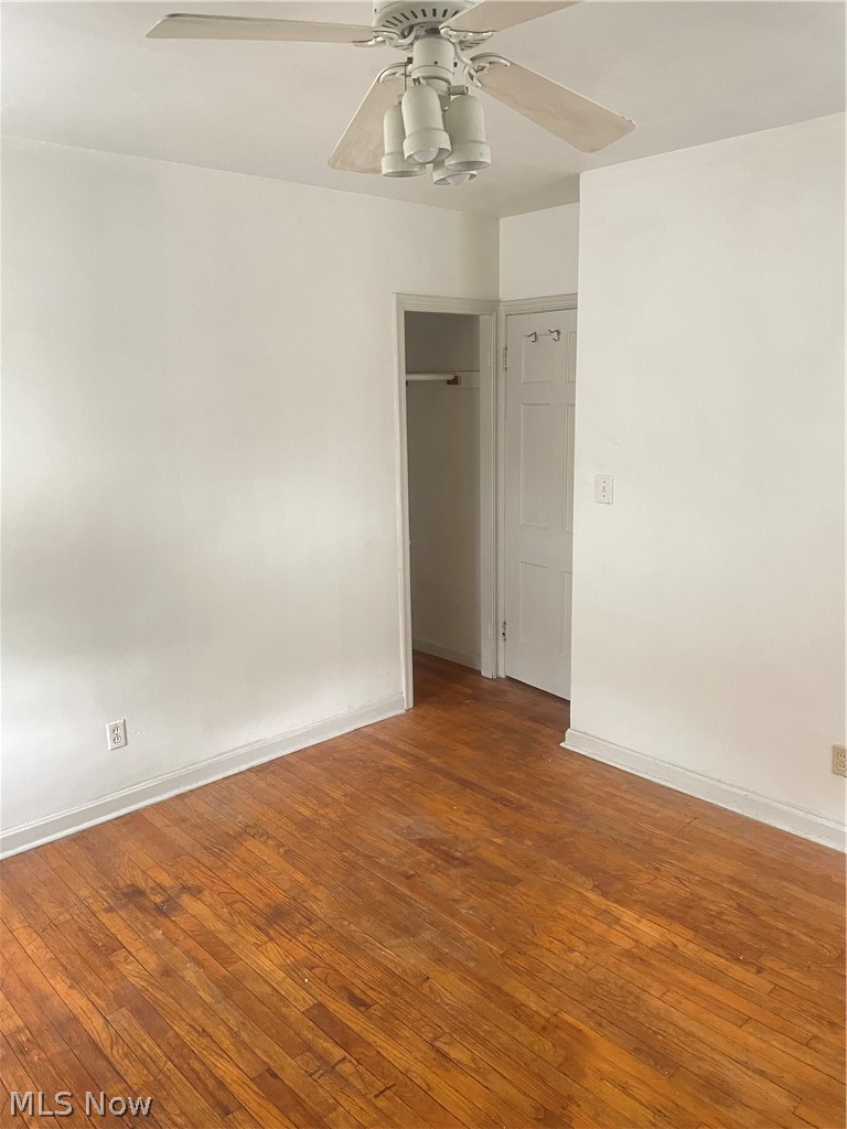 3645 Winchell Road Shaker Heights, OH 44122 - Photo 19 of 37 Empty room featuring dark hardwood / wood-style floors and ceiling fan