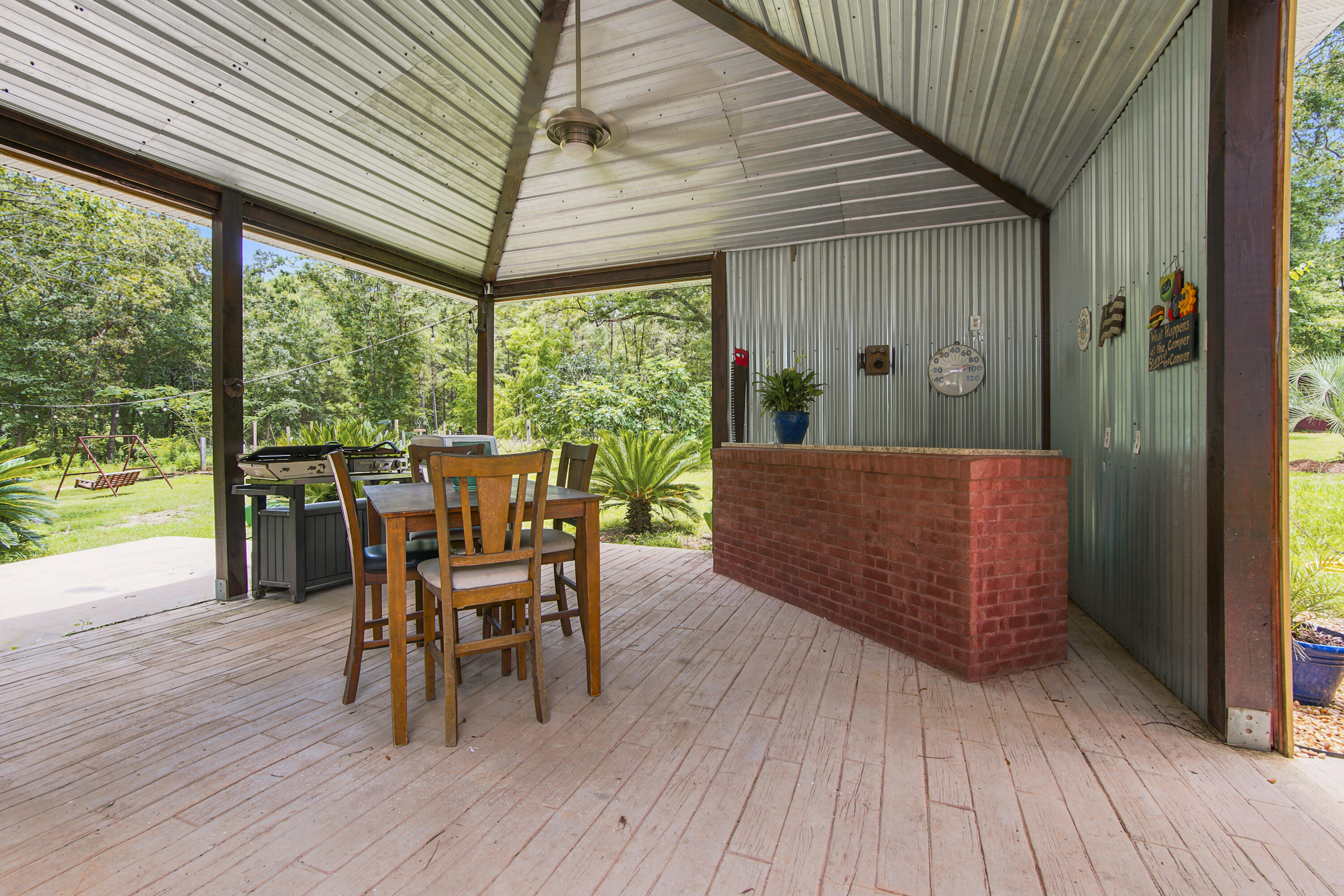 108 Hayes Road DeFuniak Springs, FL 32433 - Photo 30 of 37 outdoor bar & sitting