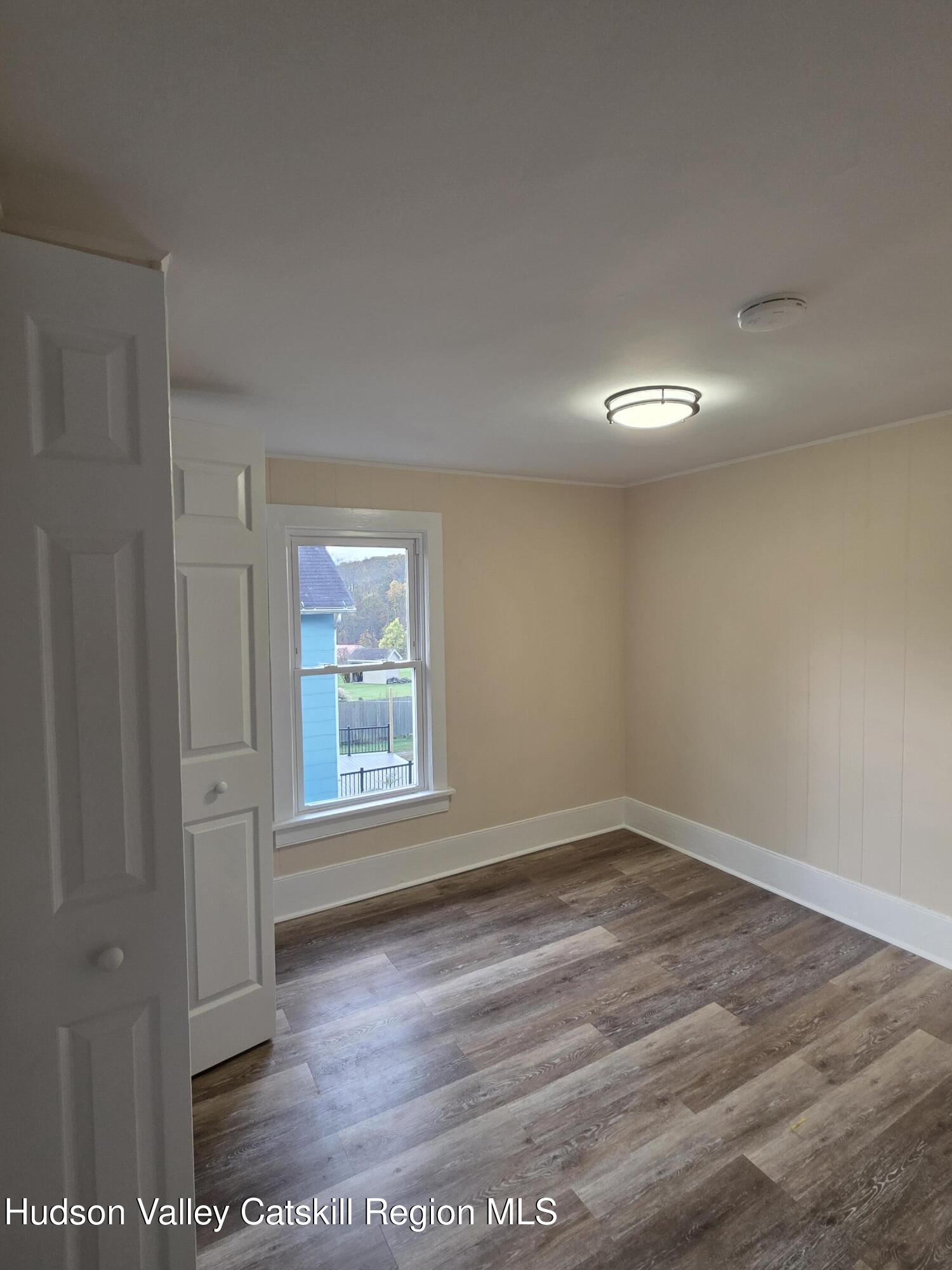 22 Maple Street Catskill, NY 12414 - Photo 13 of 16 a view of empty room with window